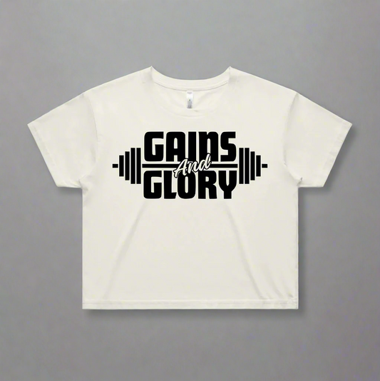 Cream t-shirt with 'Gains and Glory' text design on a white background